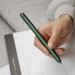 Stilform ARC gel pen made of titanium - gel pen in green in the hand