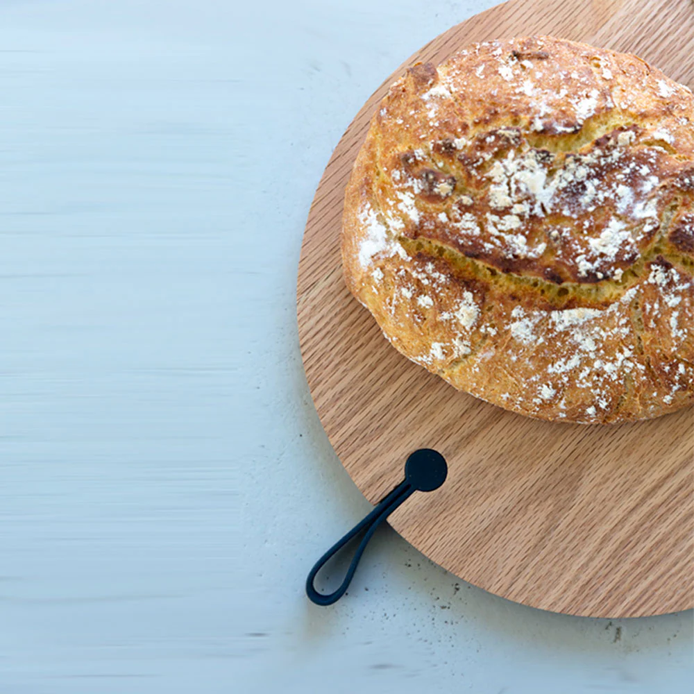 DesignBite Holz-Schneidebrett mit Silikongriff Rund