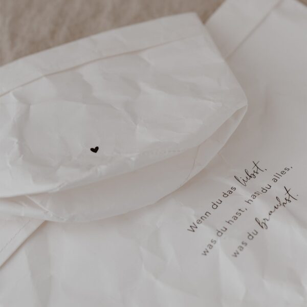 Owl cut paperbag in white in Switzerland