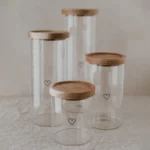 Storage jar with heart motif from the brand Eulenschnitt made of glass with wooden lid