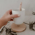 Untersetzer aus Holz mit Herz Motiv von der Marke Eulenschnitt