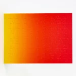 Areaware Gradient Puzzle, Small, 100 Pieces, Red & Yellow, Detail View 3 | One Horizon