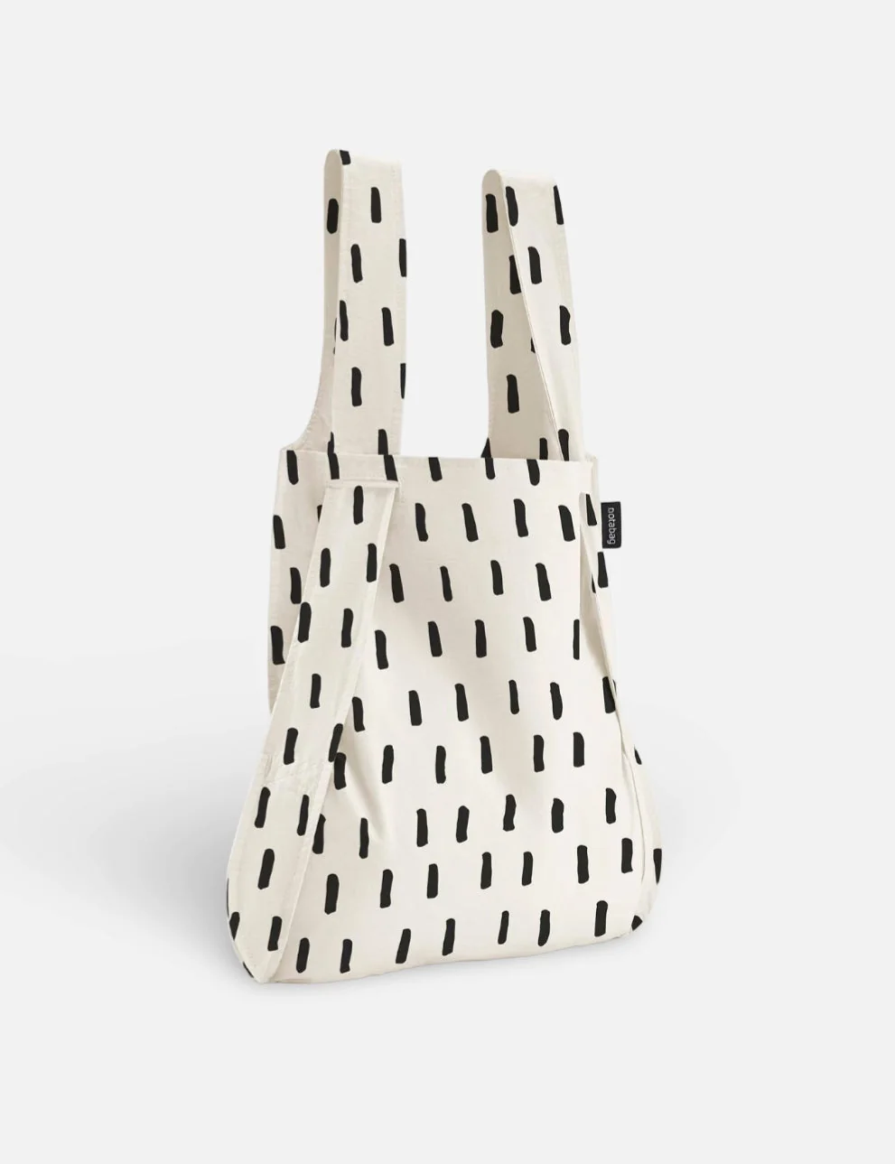 Notabag 2-in-1 Rucksack und Einkaufstasche – Muster & Dots Black Brush | One Horizon
