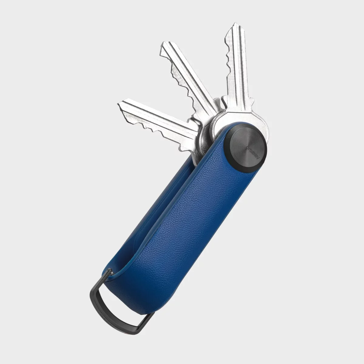 Orbitkey Key Organiser Tracker in Cobalt, geöffnet mit drei aufgefächerten Schlüsseln und D-Ring