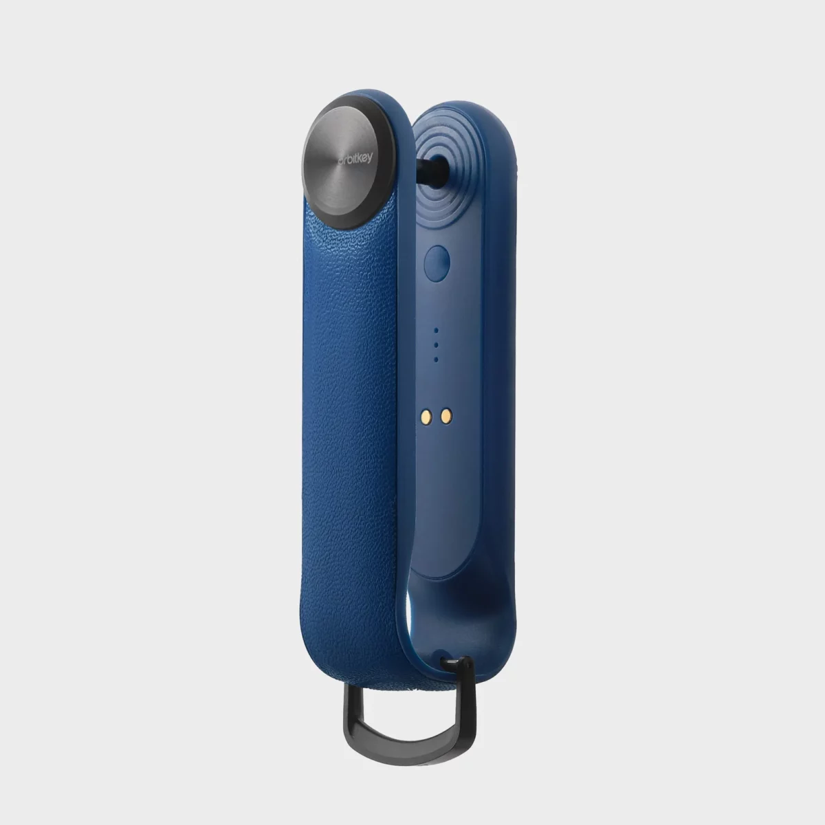 Orbitkey Key Organiser Tracker in Cobalt, Seitenansicht auf das Tracker-Modul mit magnetischen Ladekontakten