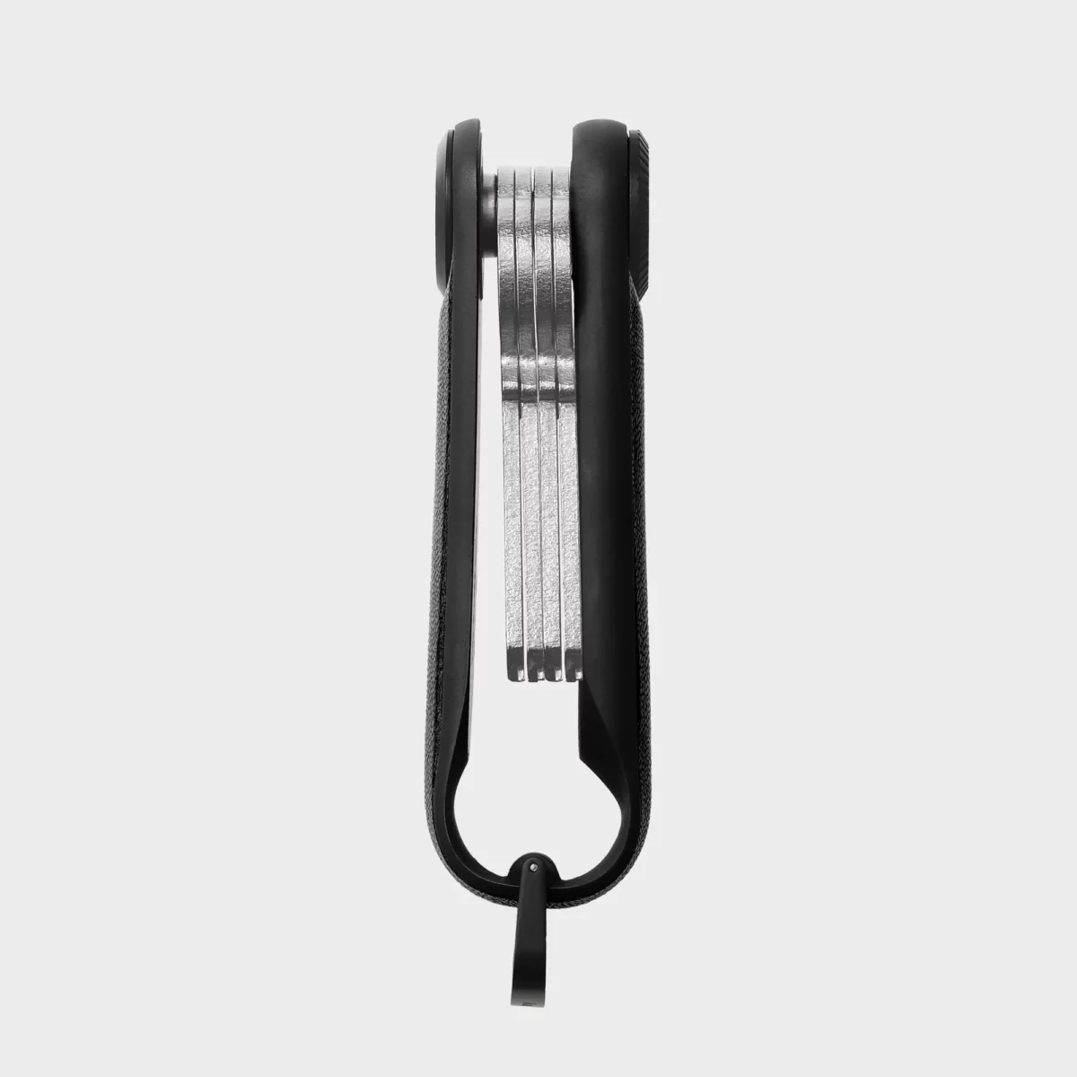Seitenansicht des Orbitkey Key Organiser Tracker in Schwarz, Schlüssel flach und klirrfrei gestapelt