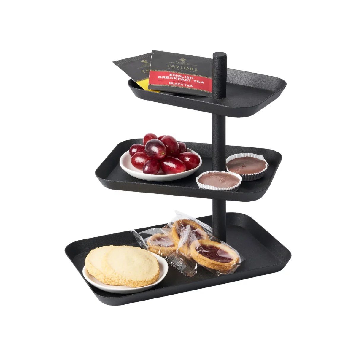 Yamazaki Etagere TOWER 3-stöckig drehbar in Schwarz, mit Ringen und Armband auf drei Tabletts, weisser Grund