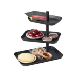 Yamazaki Etagere TOWER 3-stöckig drehbar in Schwarz, mit Ringen und Armband auf drei Tabletts, weisser Grund