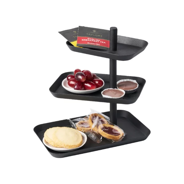 Yamazaki Etagere TOWER 3-stöckig drehbar in Schwarz, mit Ringen und Armband auf drei Tabletts, weisser Grund