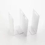 Yamazaki TOWER Towel Storage, 2-Piece Set in White; the two pieces are arranged in a staggered configuration to accommodate different shelf widths