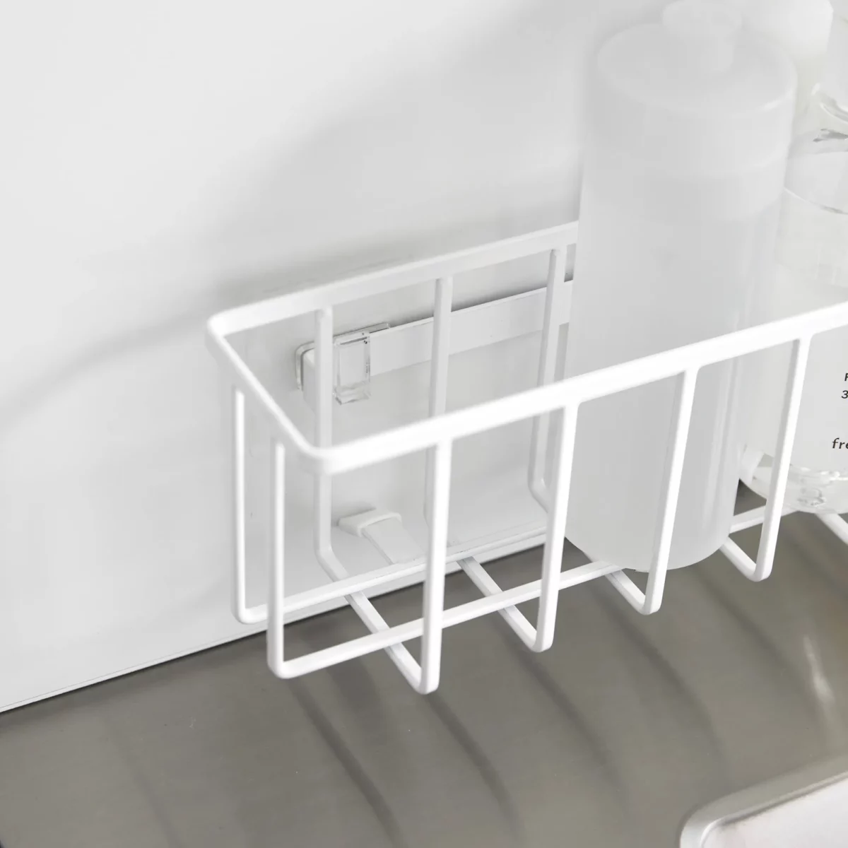 Yamazaki TOWER Film Hook multi-use basket L in white, close-up of the back with the Film Hook mount
