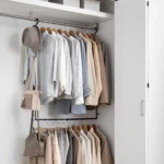 Yamazaki SMART 2-Tier Extendable Clothes Rod in Black, for use in a closet with a second level for shirts