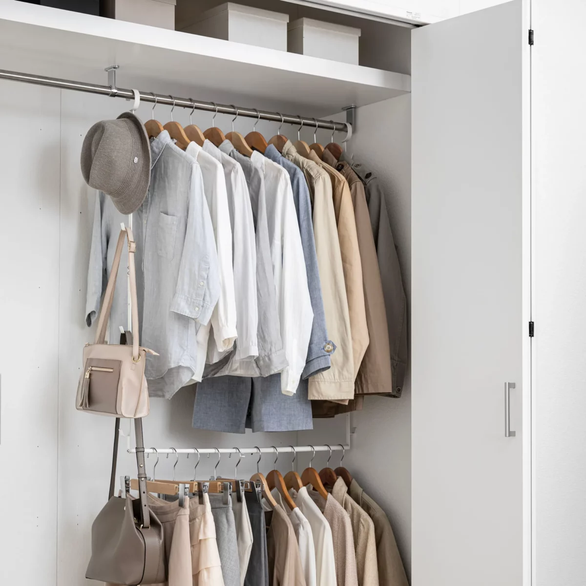 Yamazaki SMART 2-Tier Extendable Clothes Rod in White, for use in a closet with a second level for shirts