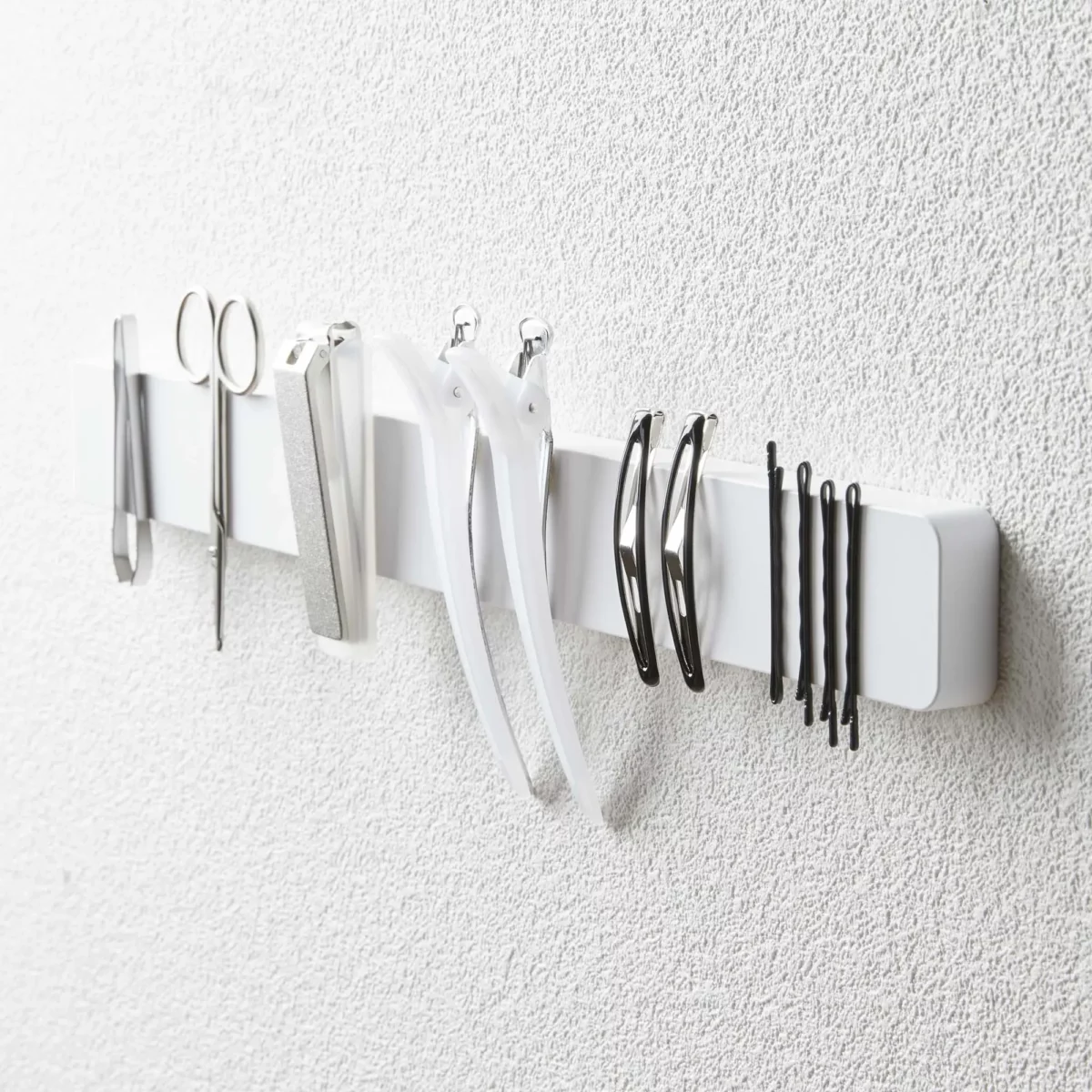 Yamazaki TOWER Magnetic Knife Rack in White, with Tweezers, Nail Scissors, and Hair Clips