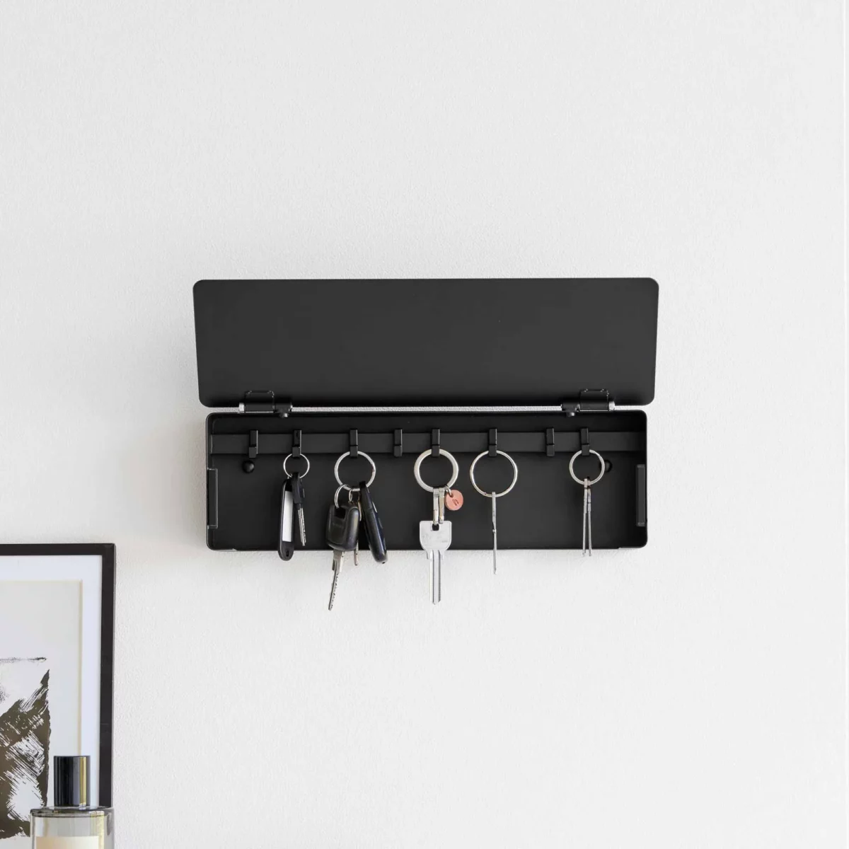 Yamazaki TOWER Wide Key Cabinet in Black, shown from the front with the lid open and five key rings