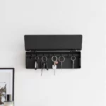 Yamazaki TOWER Wide Key Cabinet in Black, shown from the front with the lid open and five key rings