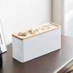 Yamazaki RIN 3-Tier Narrow Jewelry Box in White, on the dresser with rings on the lid