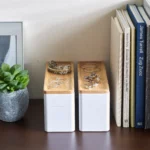 Yamazaki RIN 3-Tier Narrow Jewelry Box in White, two boxes side by side next to books