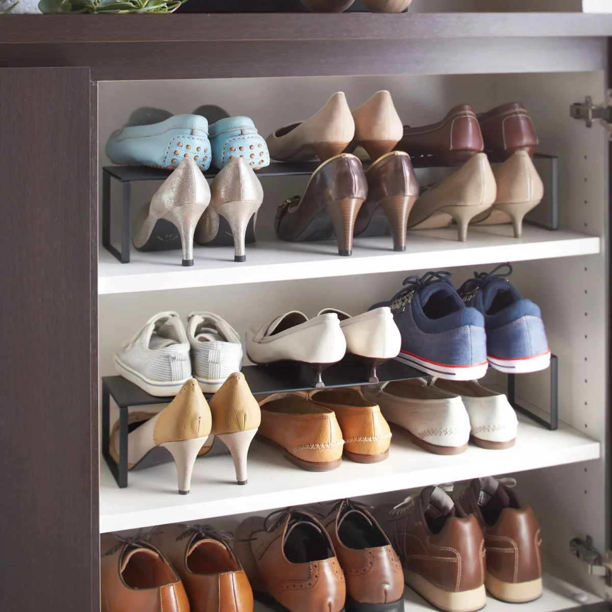 Yamazaki FRAME Shoe Rack for the Shoe Cabinet in Black, displayed in the shoe cabinet with pumps and low-cut shoes