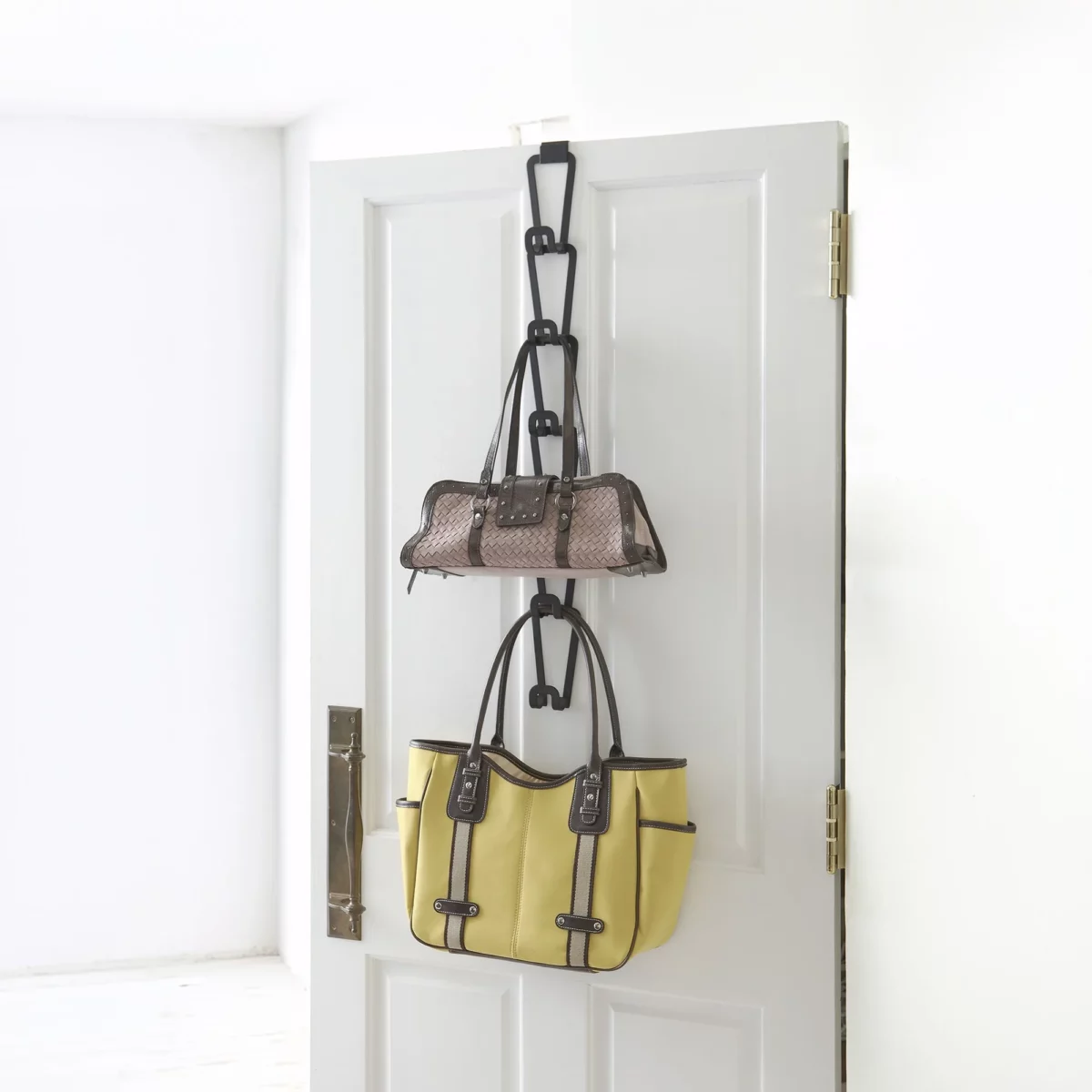 Yamazaki CHAIN S Bag Holder in Black, designed to be hung on a door with two pockets