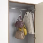 Yamazaki CHAIN S Bag Hanger for hanging, in white, in the closet next to jackets with three pockets