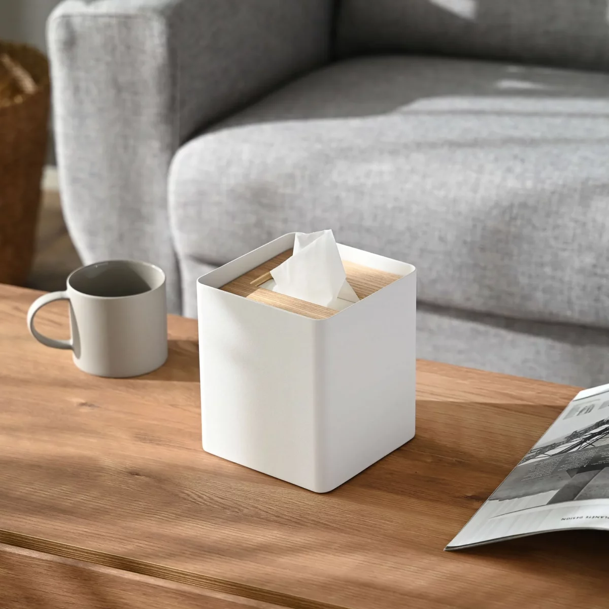 Yamazaki RIN Square Tissue Box in White, on the side table next to the sofa and a cup