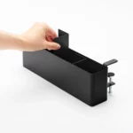 Yamazaki TOWER Narrow Table Clamp Basket in Black; the user inserts one of the two dividers