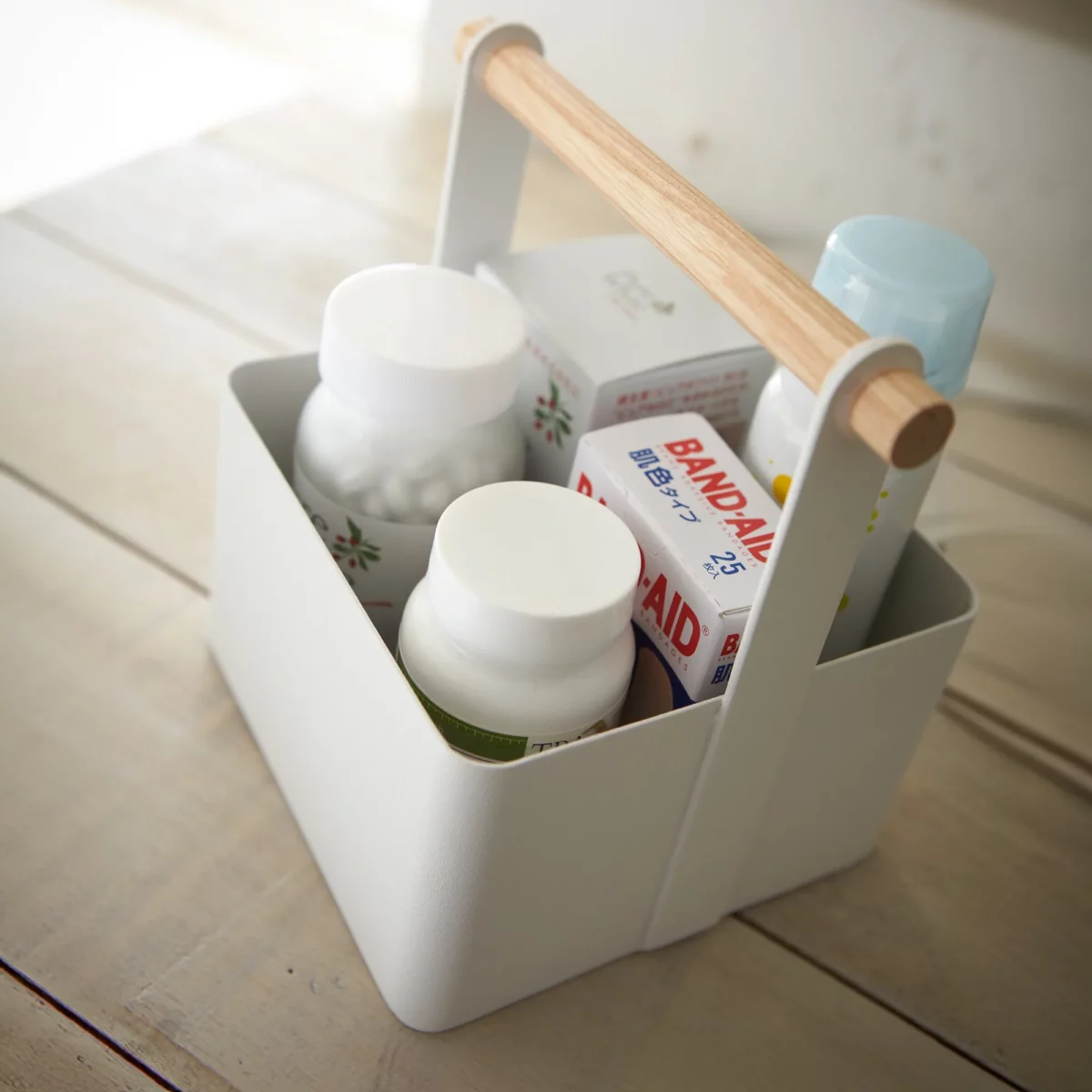 Yamazaki TOSCA Small Utensil Box in White, close-up view from above showing the wooden handle and contents