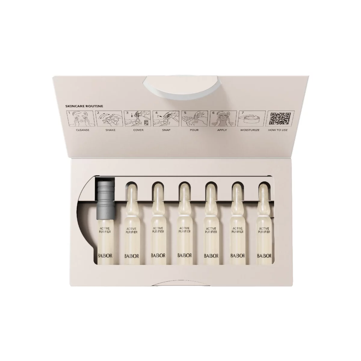 Geöffnete Packung BABOR Active Purifier mit den Ampullen in einer Reihe, dem Ampullenöffner und der Anleitung im Deckel