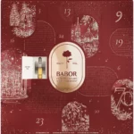 BABOR Ampullen-Adventskalender 2026 in Dunkelrot mit Rose, Ampulle im Fenster und 24 nummerierten Türchen