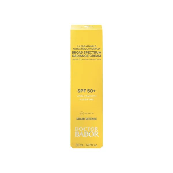 Gelbe Faltschachtel der BABOR Radiance Cream SPF 50+ mit der Aufschrift 6 % Pro-Vitamin D Antiox Ferulic Complex