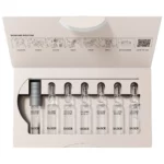 Geöffnete Packung BABOR Collagen Booster mit sieben klaren Ampullen, Ampullenöffner und Anleitung im Deckel