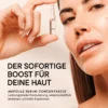 A woman holds a BABOR Hydra Plus ampoule next to her face; text: "An instant boost for your skin"