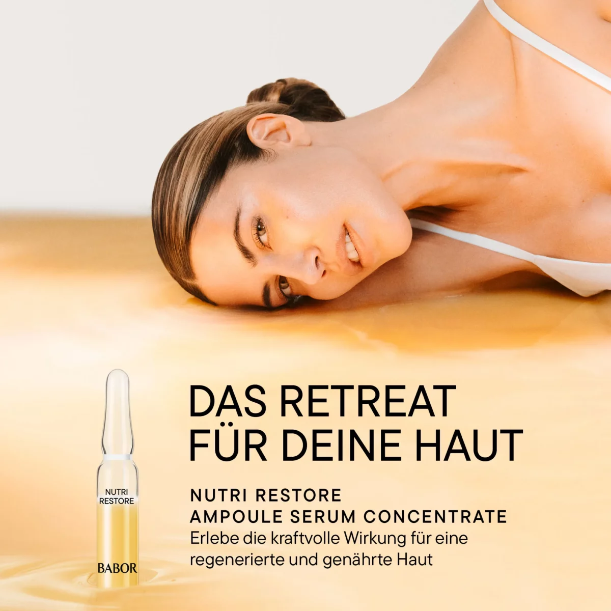 Frau liegt entspannt neben einer BABOR Nutri Restore Ampulle, Schriftzug Das Retreat für deine Haut