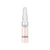 Une ampoule en verre BABOR Perfect Glow contenant un concentré rose pâle et portant une inscription noire, en plan d'ensemble