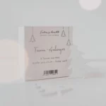 Packaging for the Eulenschnitt wooden fir tree pendants (set of 8) in white, with dimensions listed as 6 x 5 cm and a white fir tree next to it
