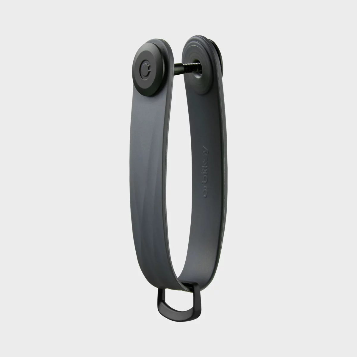 Vue de profil de l'organiseur à clés Orbitkey « Aktiv » en graphite, vierge, avec vis de fixation et anneau en D