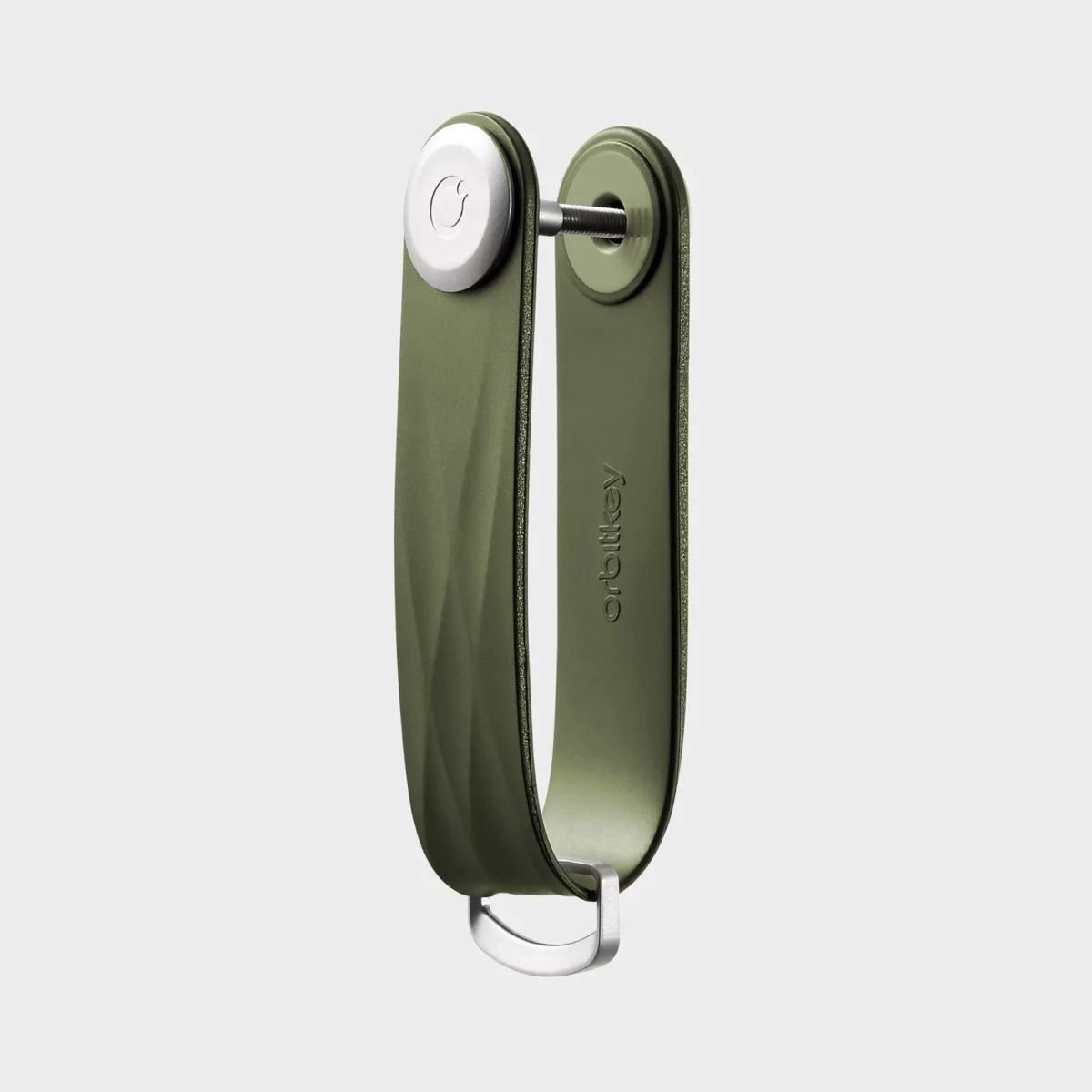 Vue de profil de l'organiseur à clés Orbitkey « Aktiv » en vert chasseur, vierge, avec vis de fixation et anneau en D
