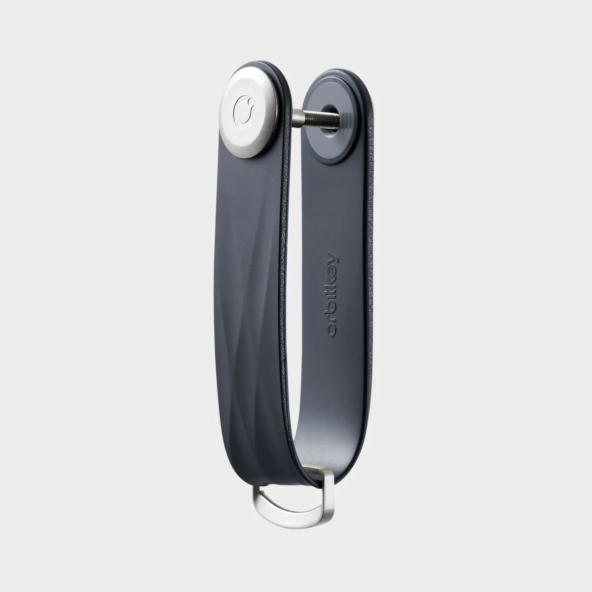 Vue de profil du porte-clés Orbitkey « Aktiv » en bleu nuit, vierge, avec vis de fixation et anneau en D