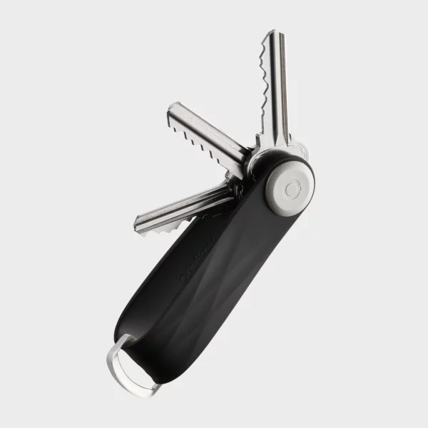 Porte-clés Orbitkey « Aktiv » en noir, ouvert, avec trois clés disposées en éventail et un anneau en D