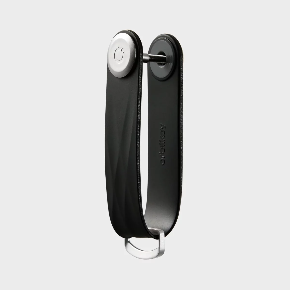 Vue de profil du porte-clés Orbitkey « Aktiv » en noir, vierge, avec vis de fixation et anneau en D