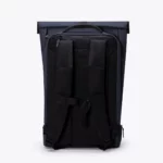 Back of the Ucon Acrobatics Hajo Pro backpack in dark navy showing the padded back panel, shoulder straps and chest strap