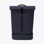 Front view of the Ucon Acrobatics Hajo Pro roll-top backpack in dark navy with the vertical zip of the front pocket