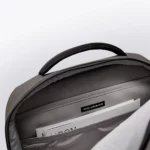 Inside the main compartment of the Ucon Acrobatics Hajo Pro backpack in dark grey with laptop sleeve and brand label