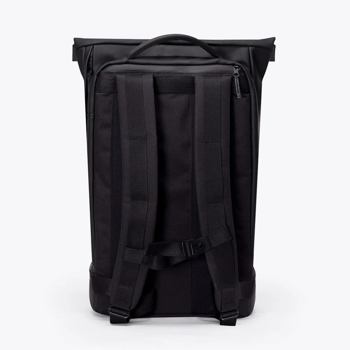 Back of the Ucon Acrobatics Hajo Pro backpack in black showing the padded back panel, shoulder straps and chest strap