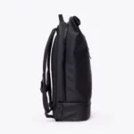 Right side view of the Ucon Acrobatics Hajo Pro backpack in black with the side zip into the main compartment