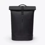 Front view of the Ucon Acrobatics Hajo Pro roll-top backpack in black with the vertical zip of the front pocket